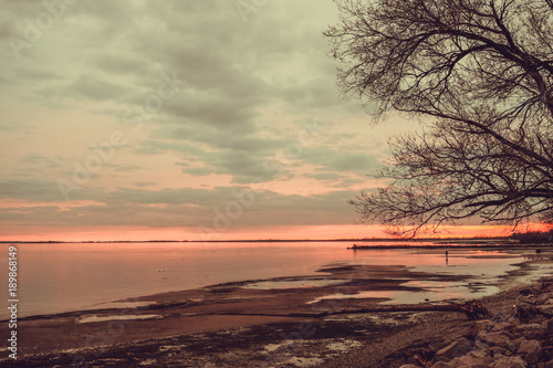 beautiful sunset view over  sea with stones © fabio Bergamasco