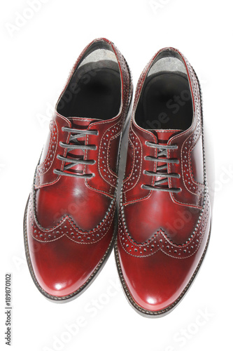 Brogues of brown genuine leather on a white background. Oxford Shoes. fashion footwear