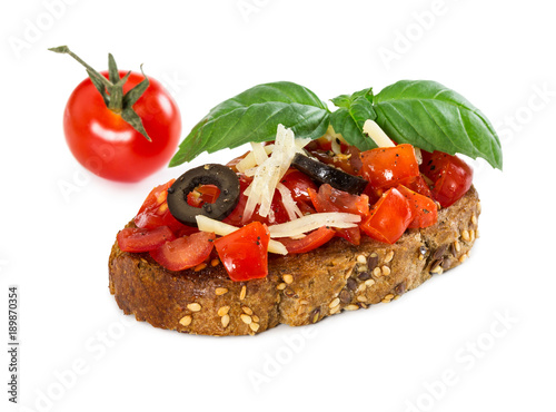 Bruschetta with fresh tomato, basil, cheese and olive