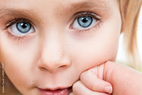 Картината върху платно Eyes of a beautiful girl with long eyelashes close-up