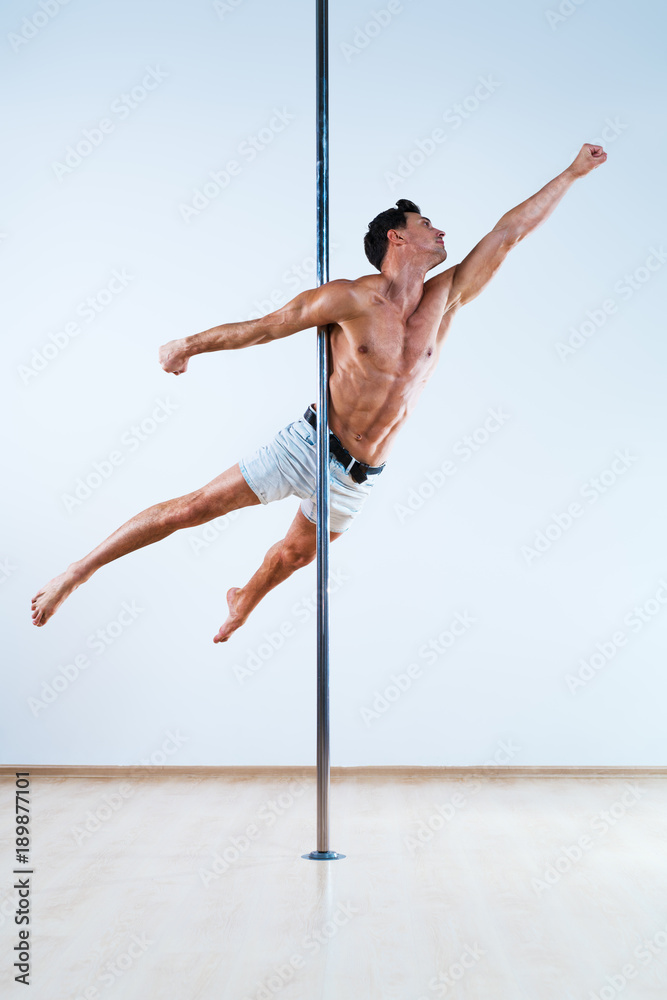 Naklejka premium Pole dancing man