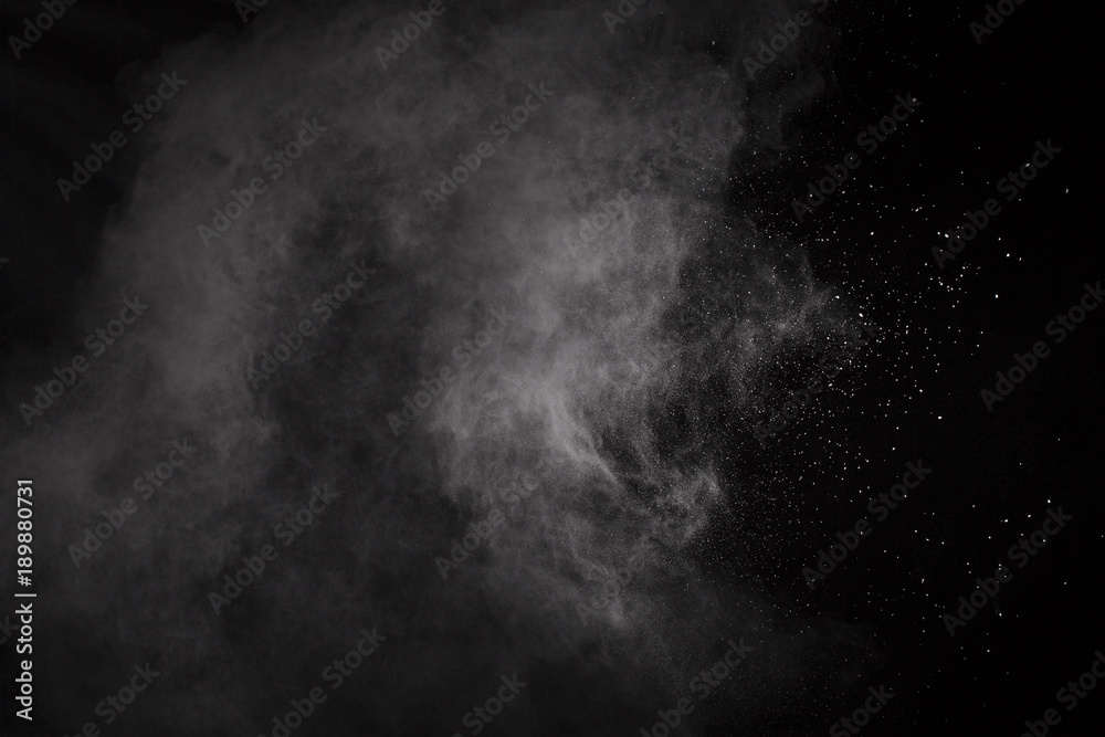 White powder. Grainy abstract texture on black background. White powder. Grainy abstract texture on black background.