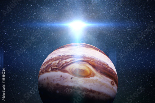 Fototapeta Naklejka Na Ścianę i Meble -  sunrise over planet Jupiter with the Sun and the stars of the galaxy 