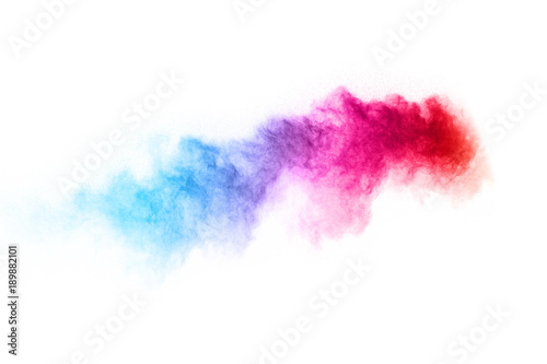 Colorful powder explosion on white background. Colored cloud. Colorful dust explode. Paint Holi. © kitsana