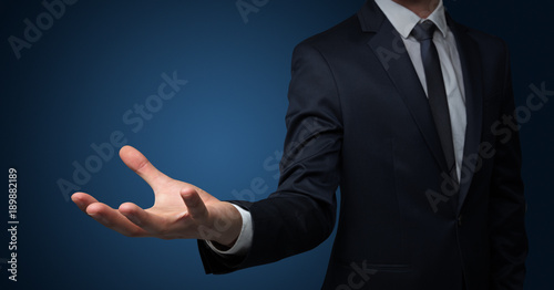 Businessman handing something without concept