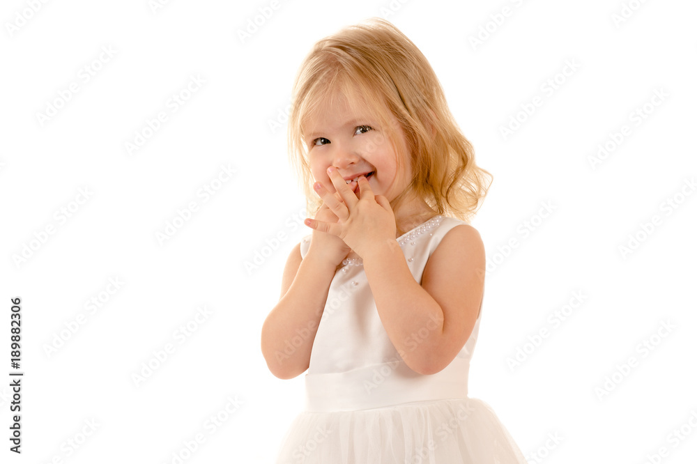 shy little baby in white dress isolated on white background shy little baby in white dress isolated on white background