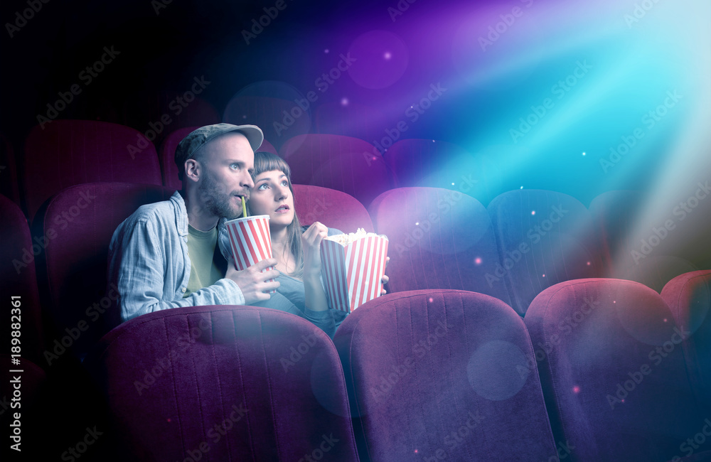 Naklejka premium Teenager couple watching movie