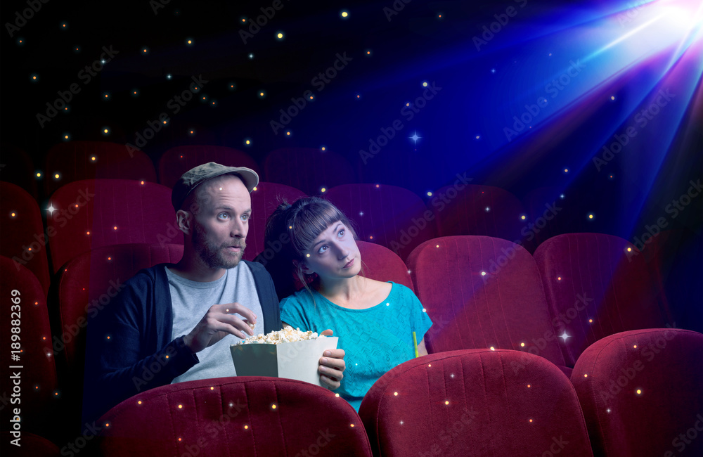 Naklejka premium Lovely couple watching 3D movie