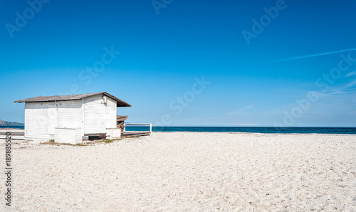 White cottage on the beach
