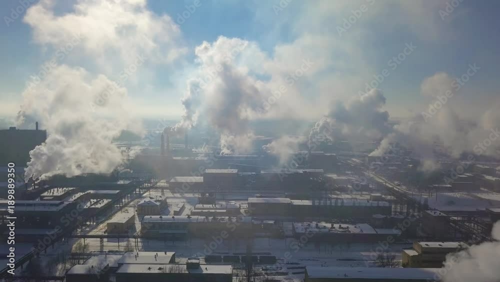 Aerial view of factory smoke stack - Oil refinery, petrochemical or chemical plant in winter Aerial view of factory smoke stack - Oil refinery, petrochemical or chemical plant in winter
