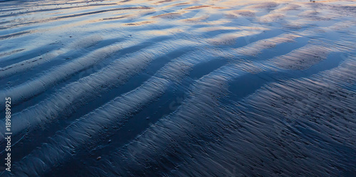 Texture of wet sand beach