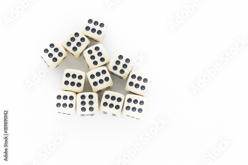 dice scattered on a light background  only sixes.