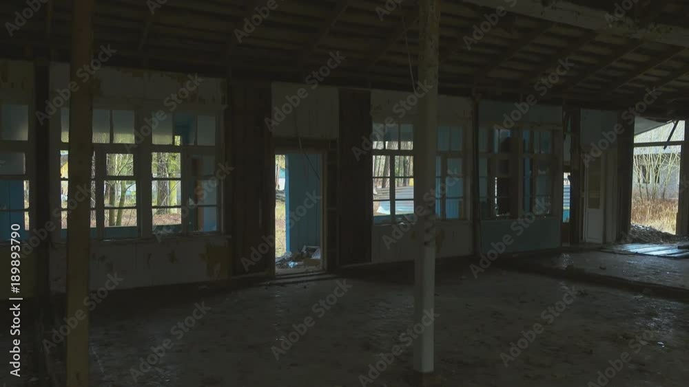 Interior of an abandoned building with broken windows Interior of an abandoned building with broken windows
