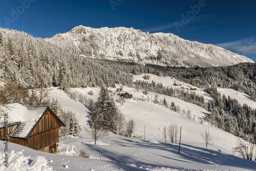 Snowy, winter landscape with Solcava panoramic road, Logarska Dolina,Slovenia.A popular tourist and travel destination.