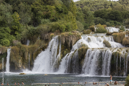 People bathing in Krka national park  through nature