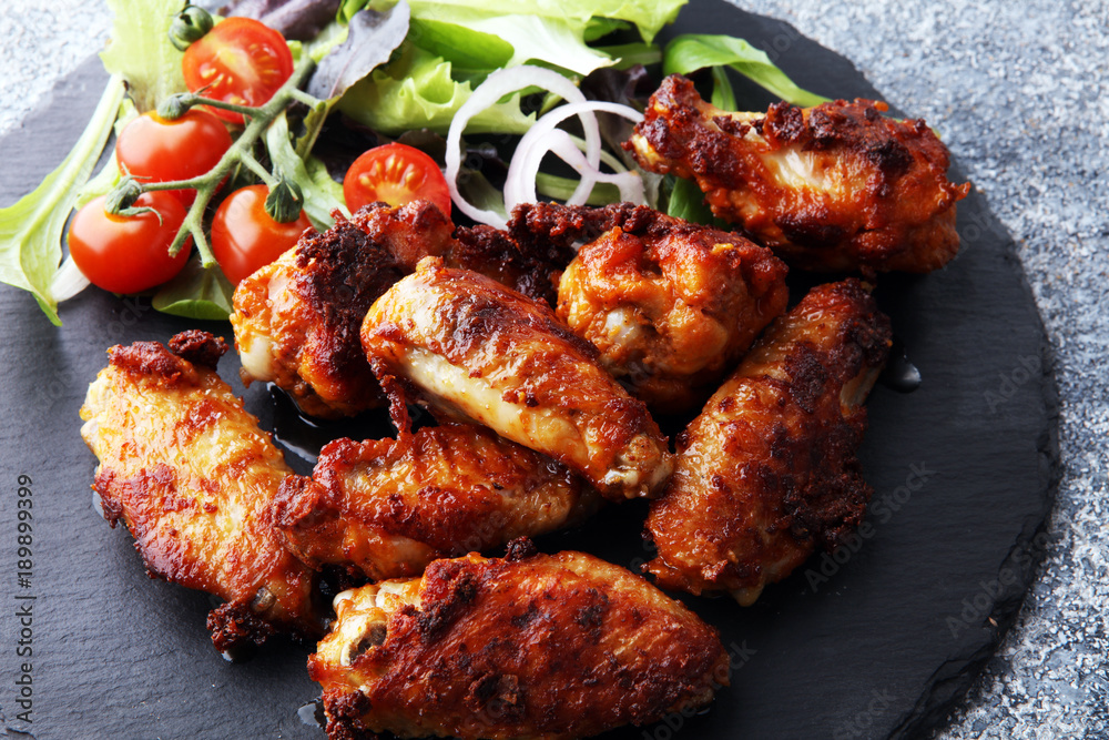 crispy barbecue chicken wings bbq on grey background crispy barbecue chicken wings bbq on grey background
