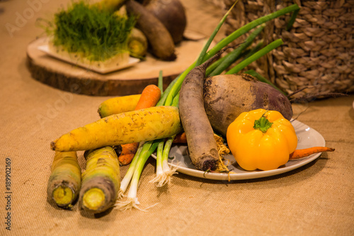 Vegetables served on the table, carrot, onion, beet and pepper