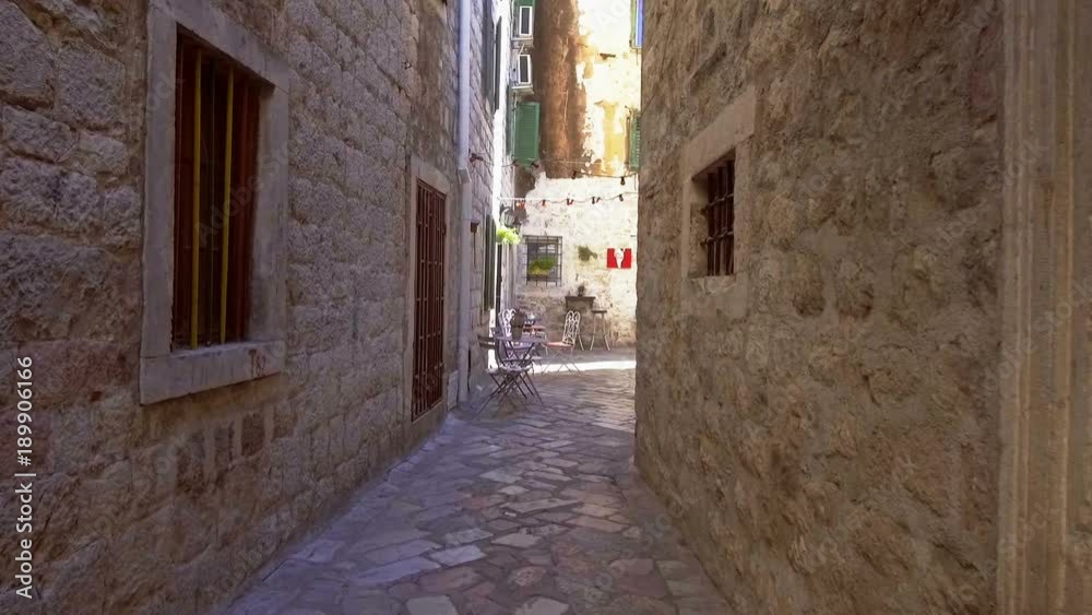 Smooth camera steady wide angle shot along street in the old town Kotor Smooth camera steady wide angle shot along street in the old town Kotor