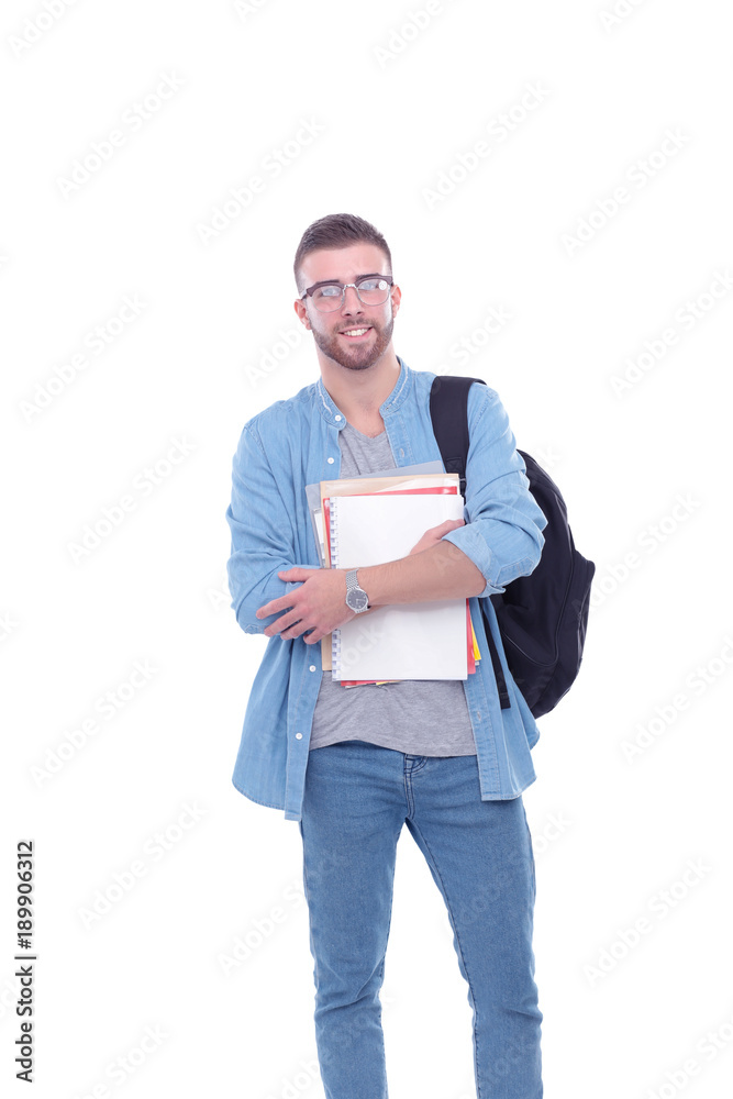 A male student with a school bag holding books isolated on white background. Education opportunities. College student. A male student with a school bag holding books isolated on white background. Education opportunities. College student.