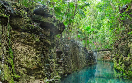 Blue river in Xcaret, Mexico photo