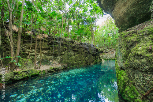Fototapeta Naklejka Na Ścianę i Meble -  Blue river in Xcaret, Mexico