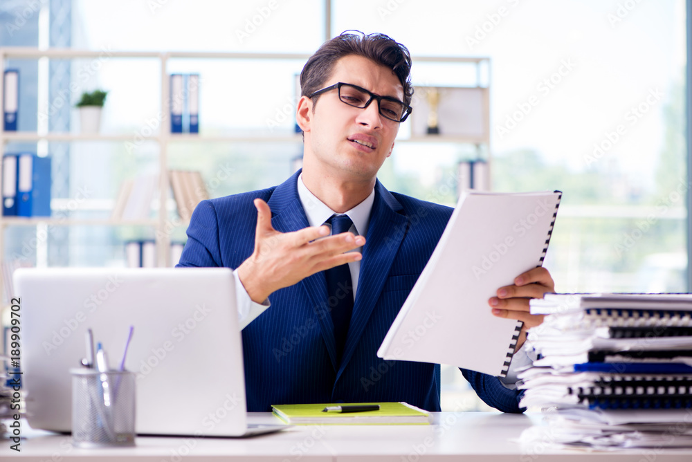 Businessman working in the office Businessman working in the office