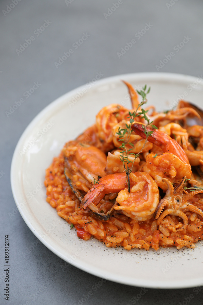 seafood risotto with mussel shrimp and squid , italian food seafood risotto with mussel shrimp and squid , italian food
