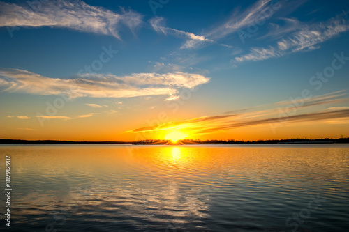 Sunset over a lake in Oklahoma. © crotonoil
