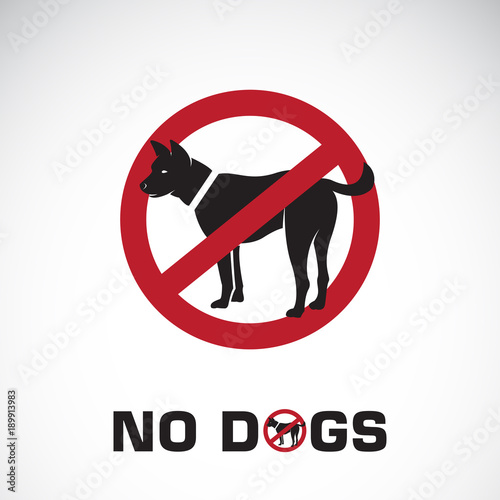 Vector of dog in red stop sign on white background. No dogs. Pet prohibition sign. Animal. Easy editable layered vector illustration.