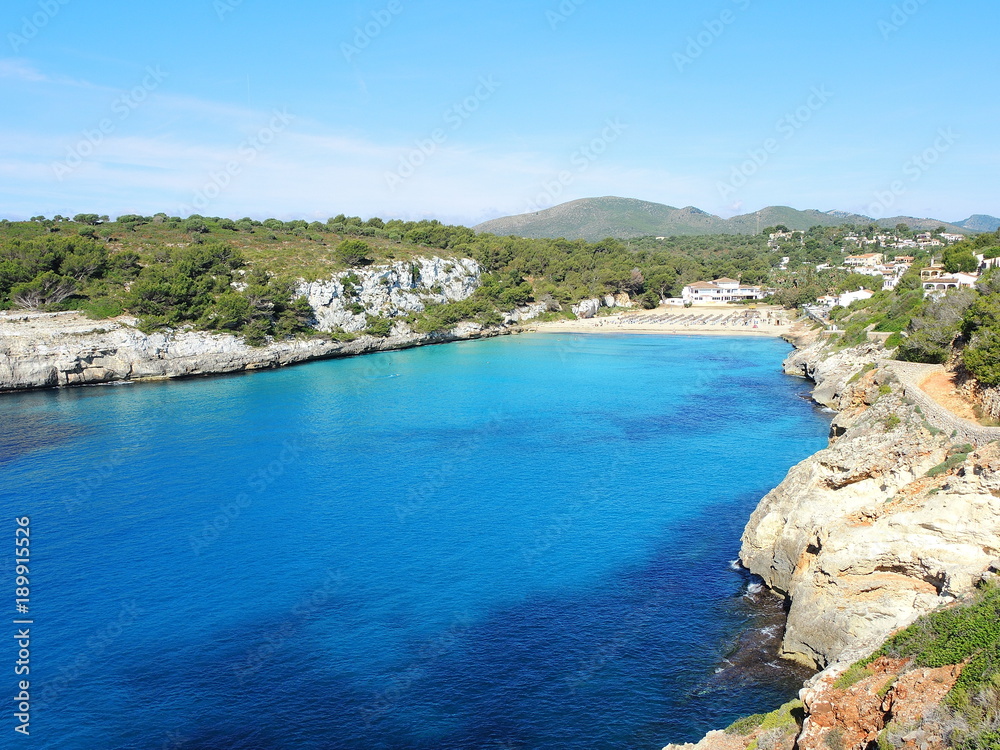 Landscape of the beautiful bay of Cala Estany d'en Mas with a wonderful turquoise sea, Cala Romantica, Porto Cristo, Majorca, Spain
