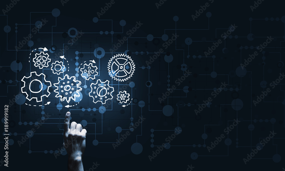 Glowing cogwheel mechanism icon on dark background as symbol of teamwork Glowing cogwheel mechanism icon on dark background as symbol of teamwork