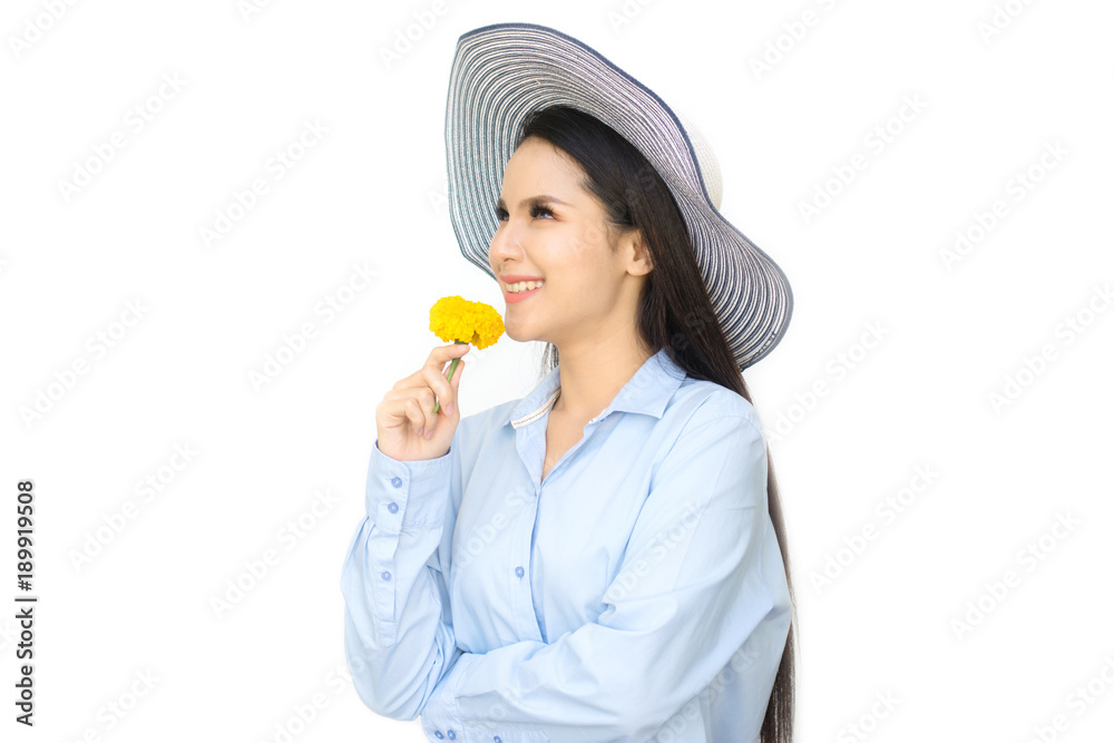 Beautiful woman with a yellow marigold flower on her ear isolated on white background Beautiful woman with a yellow marigold flower on her ear isolated on white background