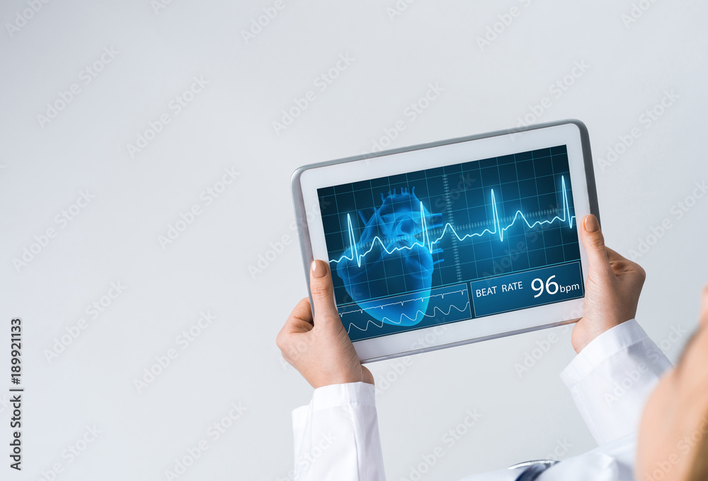 Close of female doctor hands working with tablet pc computer Close of female doctor hands working with tablet pc computer