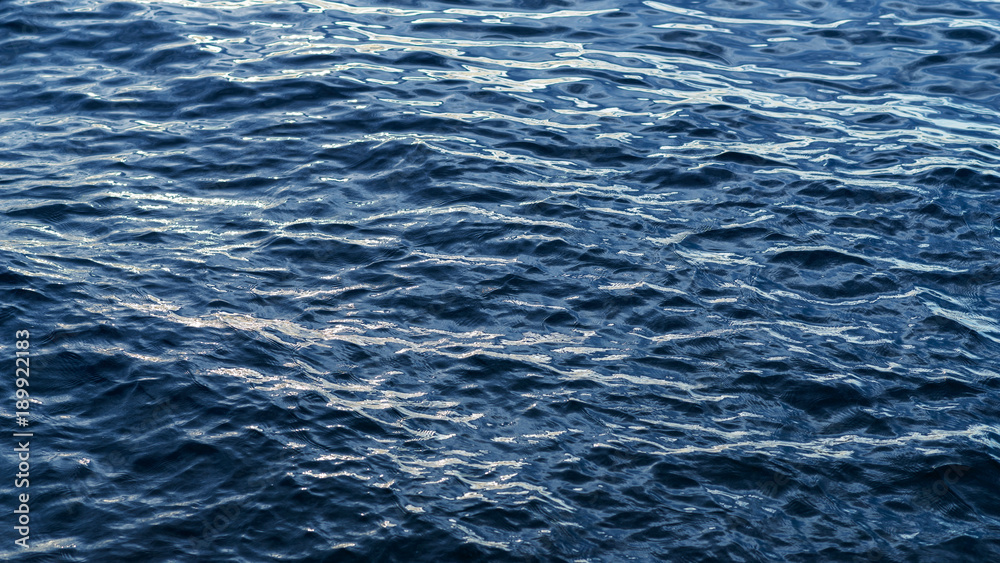 Obraz premium Sea surface as natural background, color toned.