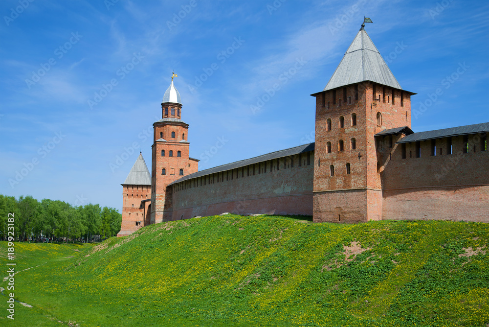 Three ancient towers of the Novgorod Kremlin on a sunny May day. Veliky Novgorod, Russia