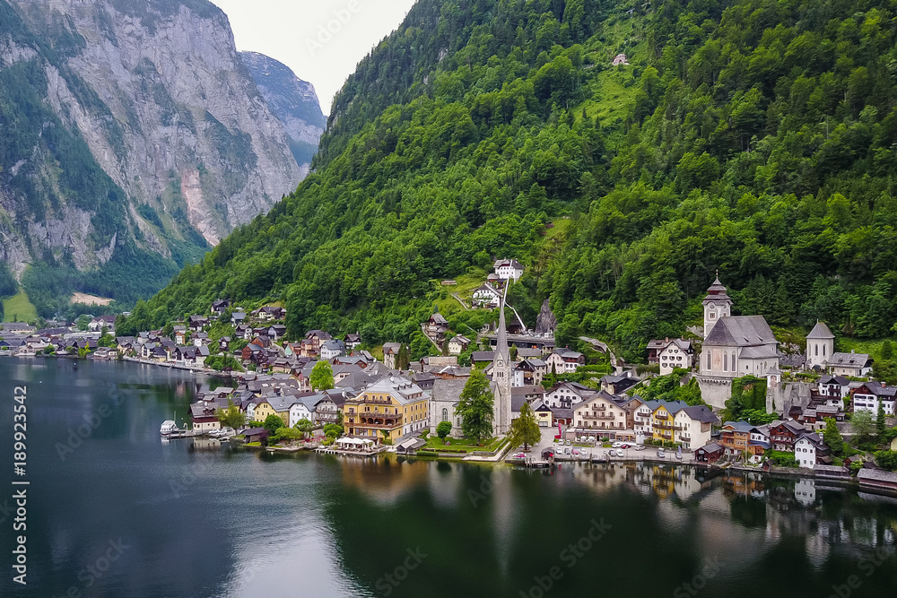 Nice  View from Hallstatt , Austria . Took this photo by drone during summer afternoon in cloudy day . Fly the drone in the city centre , The view look different from what we always see 