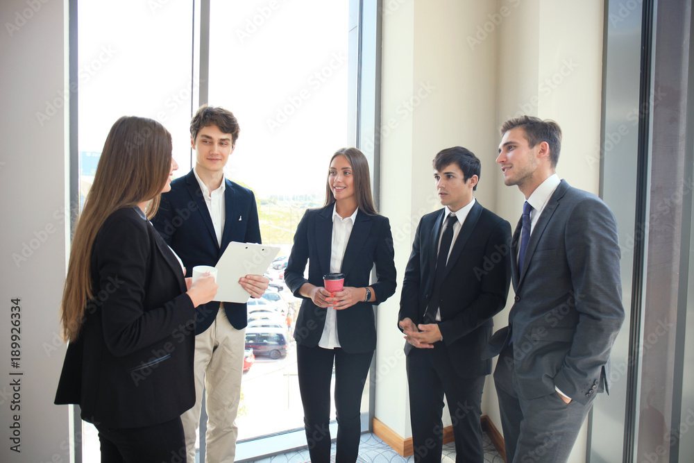 Group of business people discussing ideas at meeting. Group of business people discussing ideas at meeting.