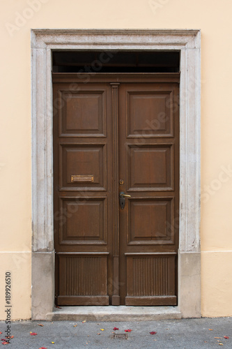 Front view of old brown front door
