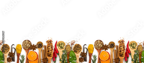 Fototapeta Naklejka Na Ścianę i Meble -  Different spices, seasonings and herbs isolated on white. Seamless horizontal pattern.