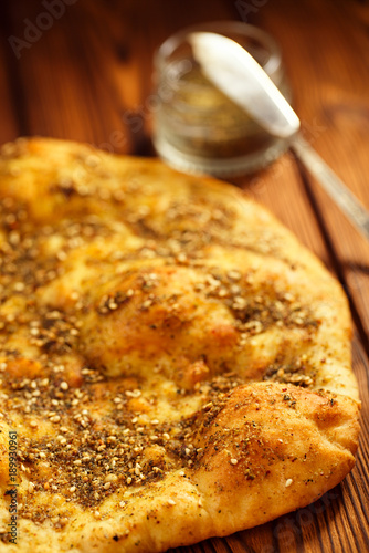 Zaatar spice mix with naan bread photo