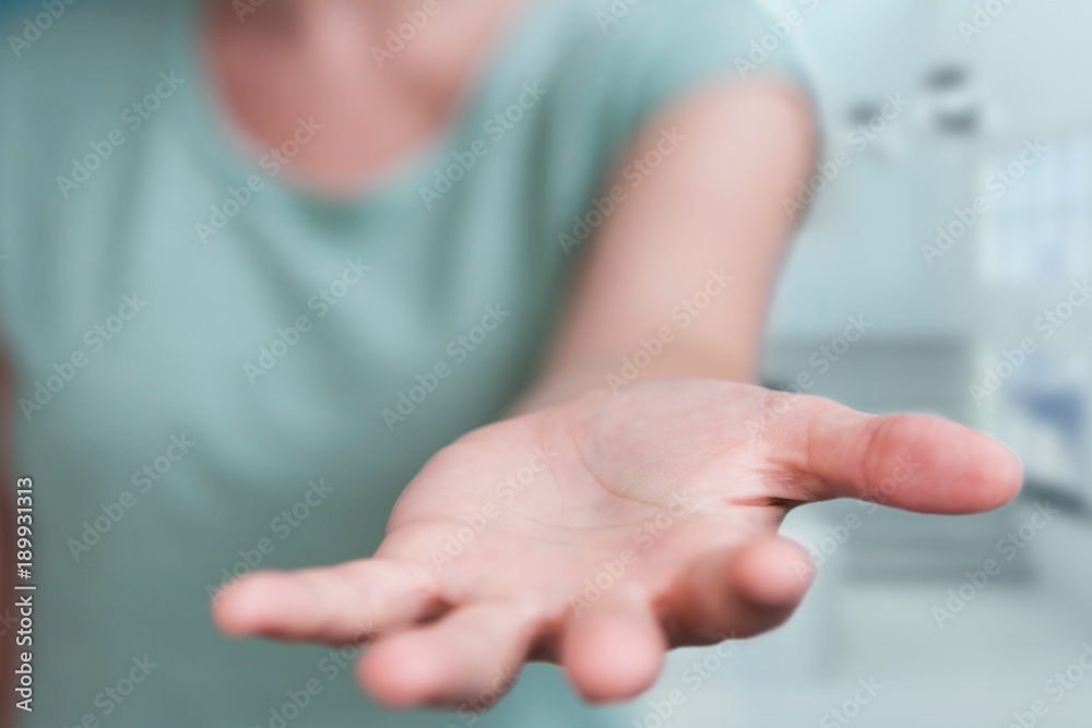Businesswoman giving one hand Businesswoman giving one hand