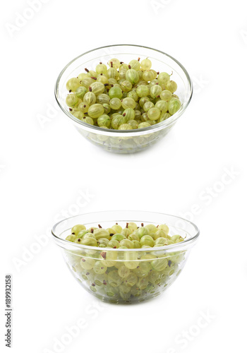 Gooseberries in a glass bowl isolated