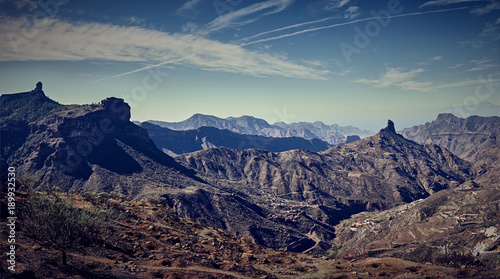 Mountainous landscape of Gran Canaria in Spain   Mountain peak of  Roque Bentaiga  next to mountain peak of  Roque Nublo 
