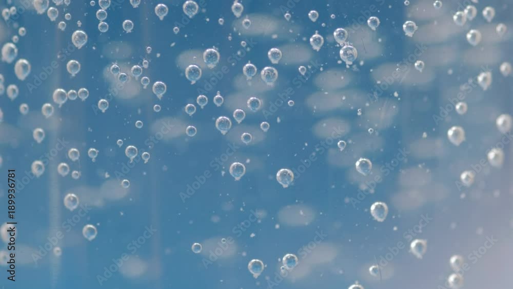 Oxygen bubbles on glass. Selective focus on with shallow depth of field.
Oxygen bubbles on glass. Selective focus on with shallow depth of field.