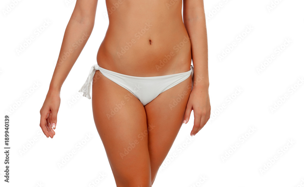 Beautiful body girl wearing white bikini isolated