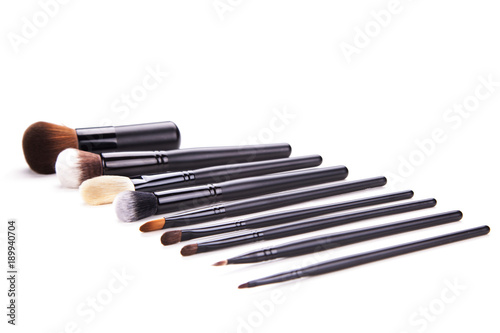 Some different kind of make-up brushes isolated on white