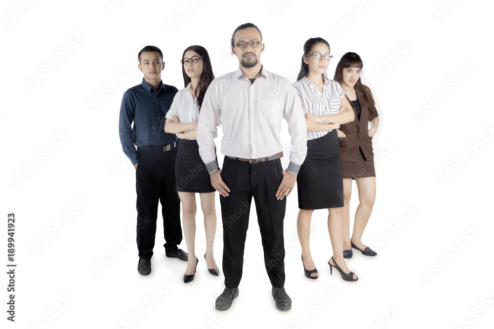 African manager standing with his team on studio African manager standing with his team on studio