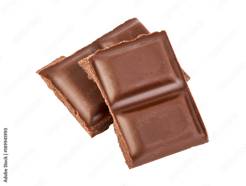 Milk chocolate pieces isolated on white background. Milk chocolate pieces isolated on white background.