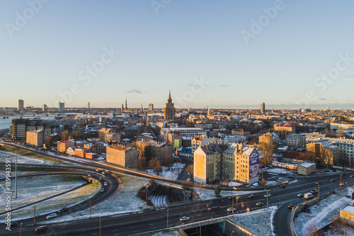 Riga elevated road junction and interchange overpass at winter sunset time