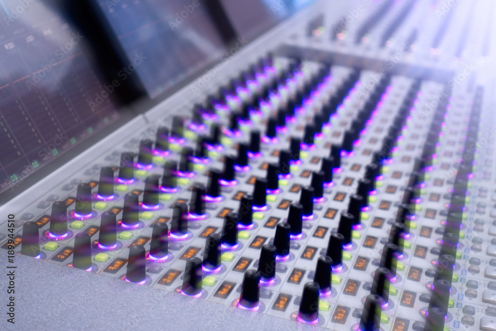 Obraz premium Professional sound engineer's console. Remote control for the sound engineer. Mixing consoles. Remote concert sound engineer. 